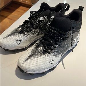 Under Armour Cleats. Size 10.5. White and black in color